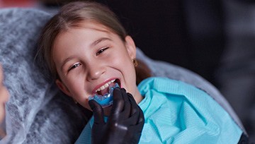 Child at the dentist getting a mouthguard