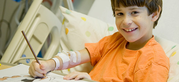 Young boy in hospital bed