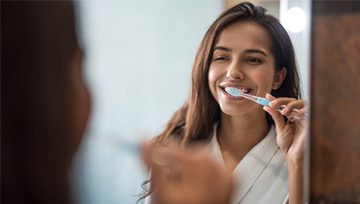 Person brushing their teeth