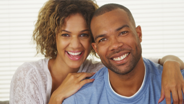 Happy couple with attractive smiles