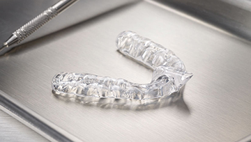 Clear plastic nightguard for teeth grinding