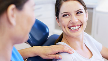 Woman smiling in dental chair