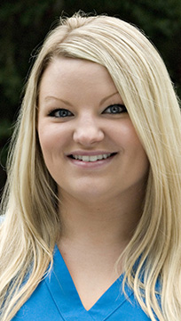 Headshot of team member Ashley