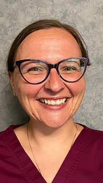 Headshot of Team Member Casey