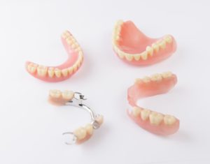 Four denture restorations.