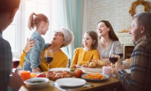 happy family eating dinner 