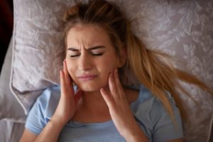 a patient experiencing jaw pain in Ann Arbor