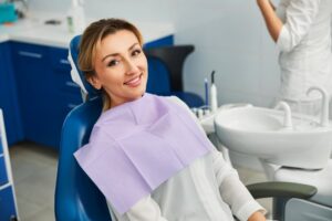 Woman smiling in her dentist's chair